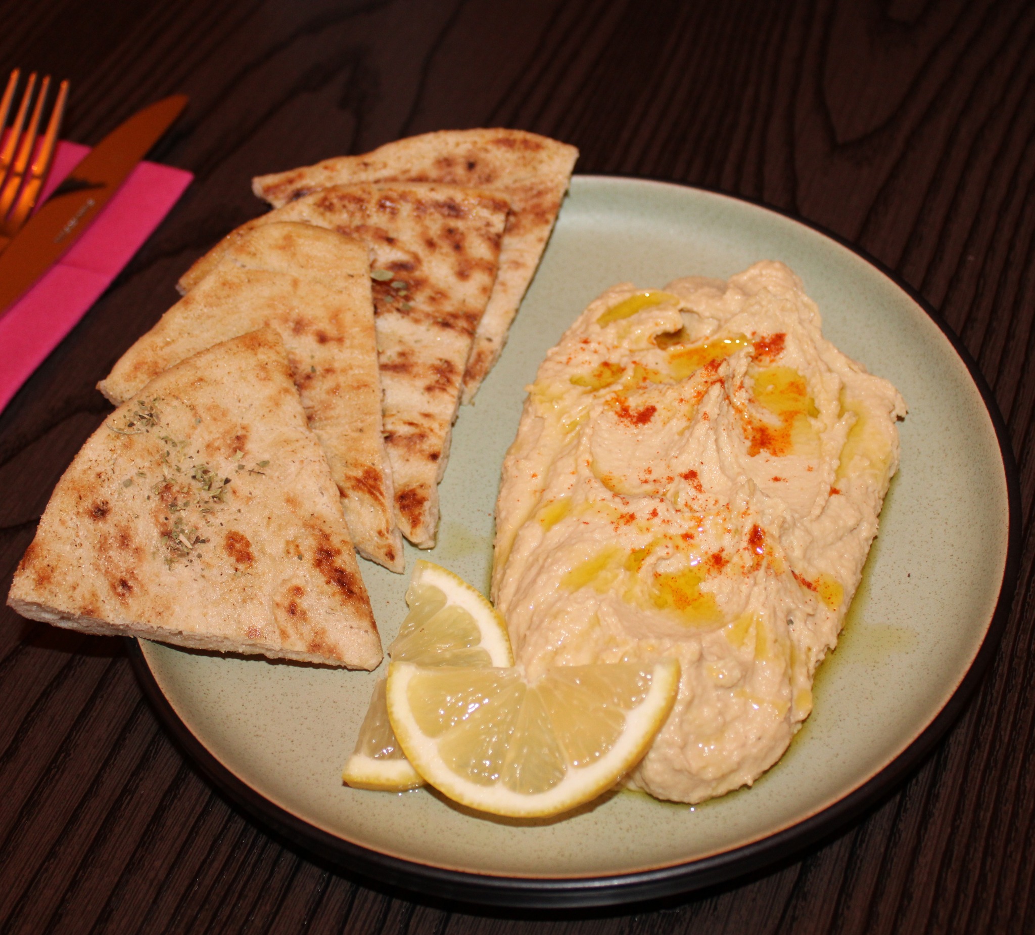  Plate of creamy Hummus, served with warm pita bread and lemon wedges at Greek Theory, Falkirk 